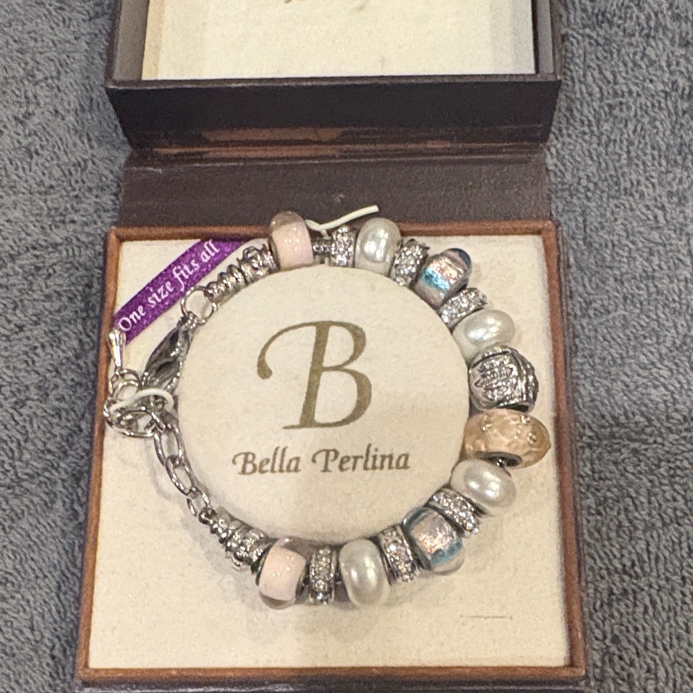 Bella Perlina Silver and Pink Charm Bracelet. Never worn